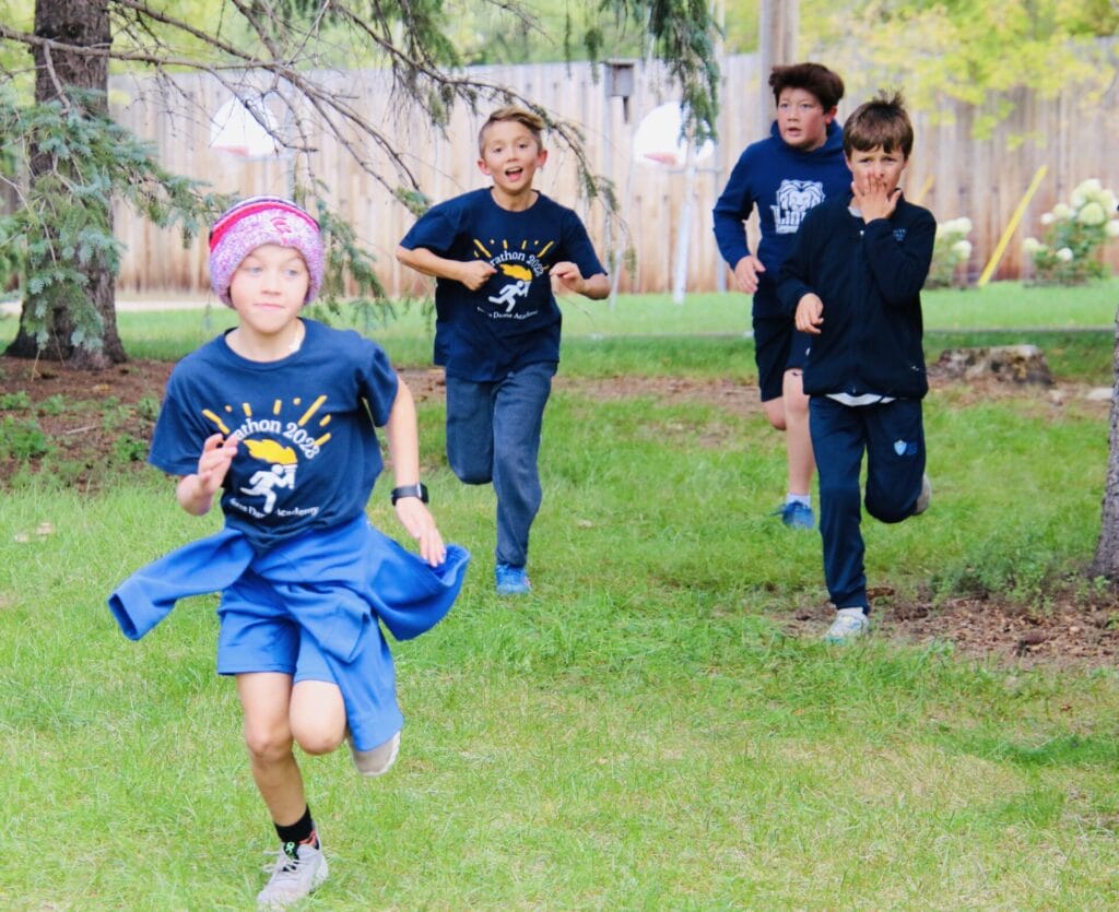 Students run in the Notre Dame Academy Marathon.